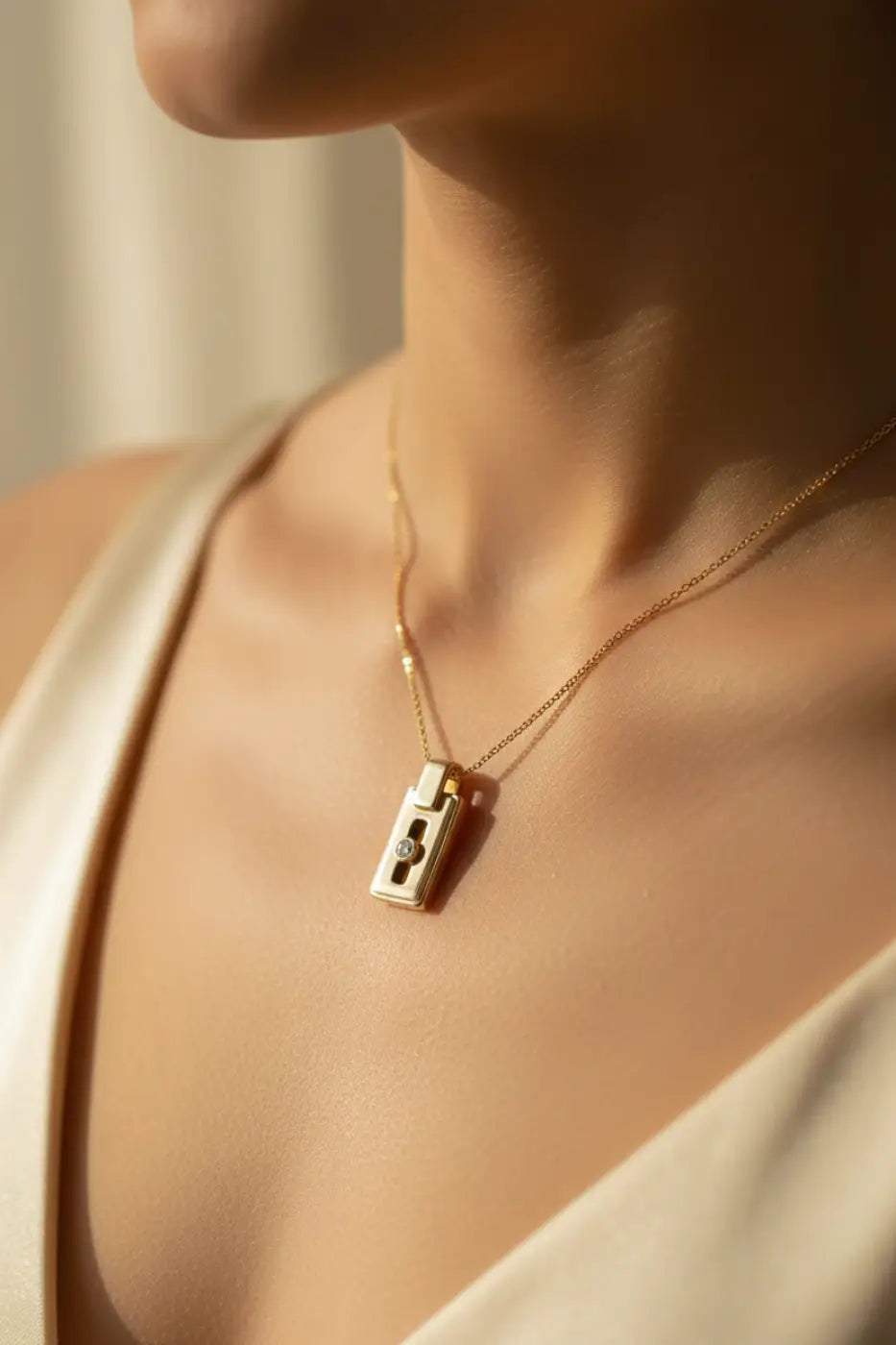 14ct gold diamond pendant featuring a sleek gold-toned rectangular design with a lab-grown diamond accent