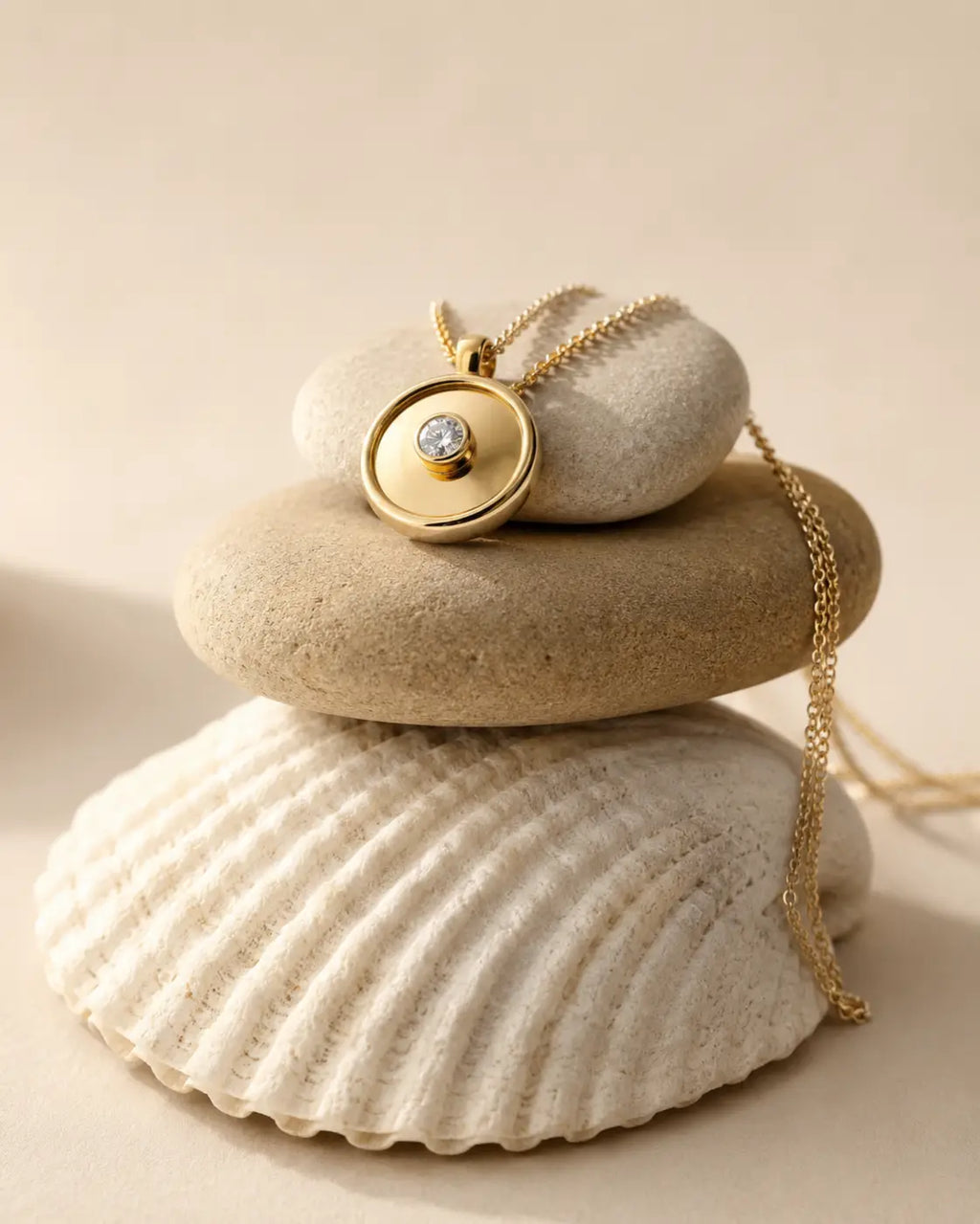 Engraved 14ct gold yellow circular pendant necklace designed with a central 3mm lab diamond resting on stones