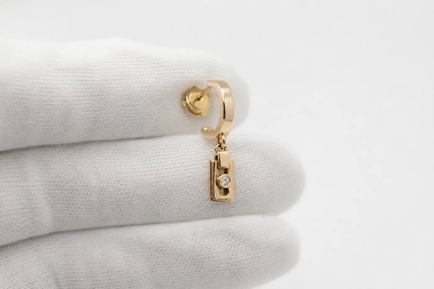 Gold-tone miler axis drop earrings with solid 14ct yellow gold rectangular pendant and 2mm diamond center