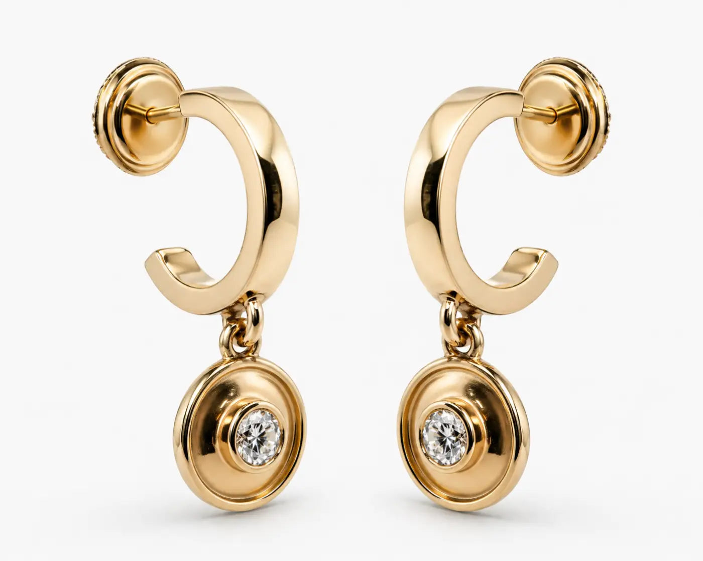 Polished gold diamond drop earrings featuring solid 14ct yellow gold hoops with a dangling circular pendant and central diamond