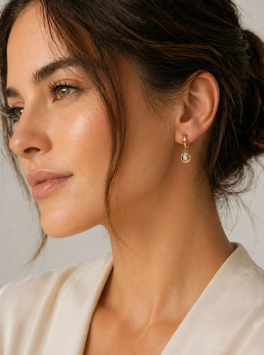 Polished gold diamond drop earrings featuring solid 14ct yellow gold hoops with a clear gemstone pendant